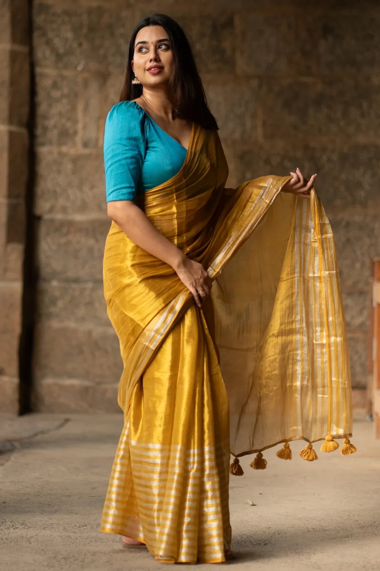 Metallic Zari tissue Saree With Handmade Tassels
