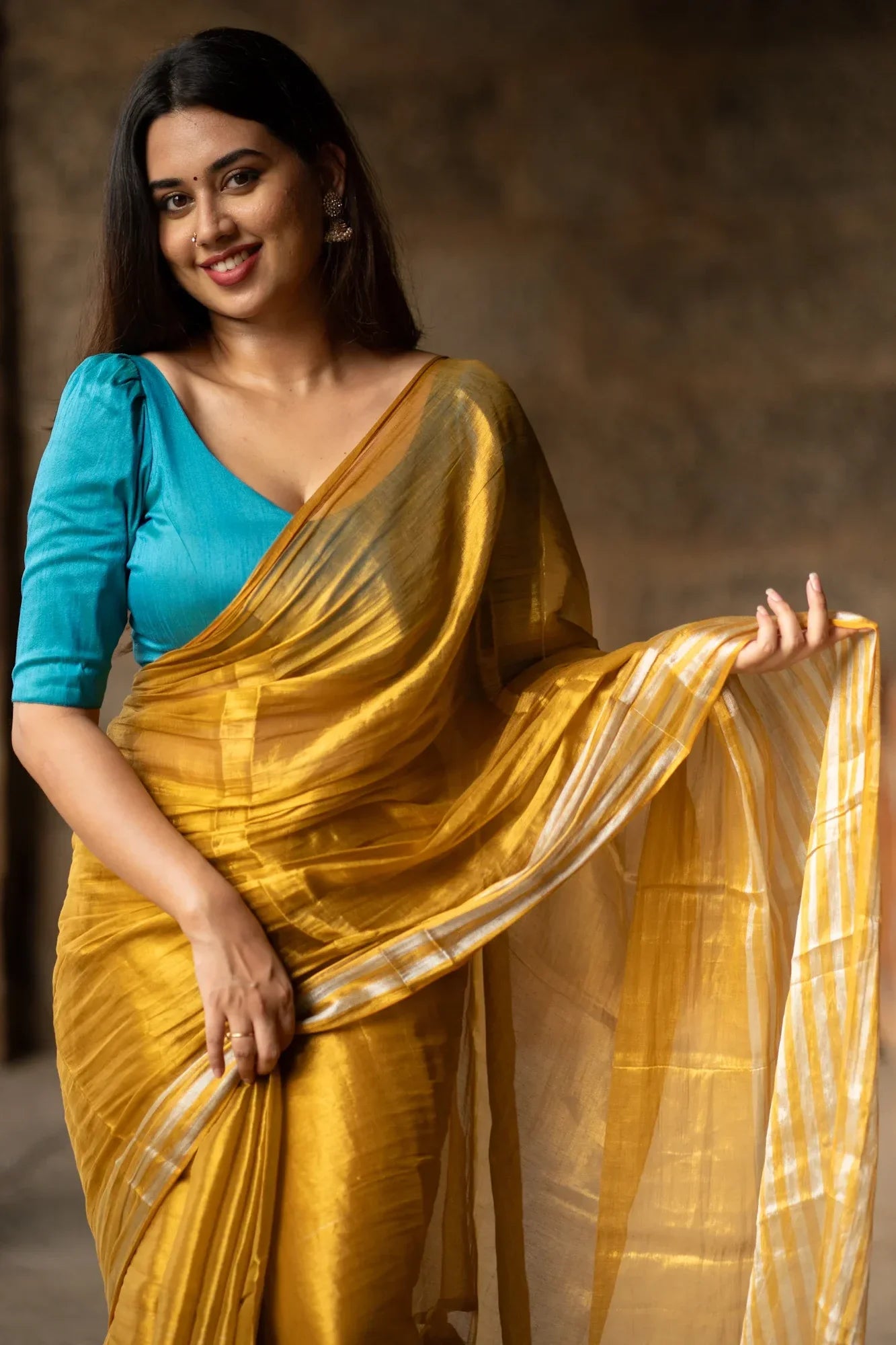 Metallic Zari tissue Saree With Handmade Tassels