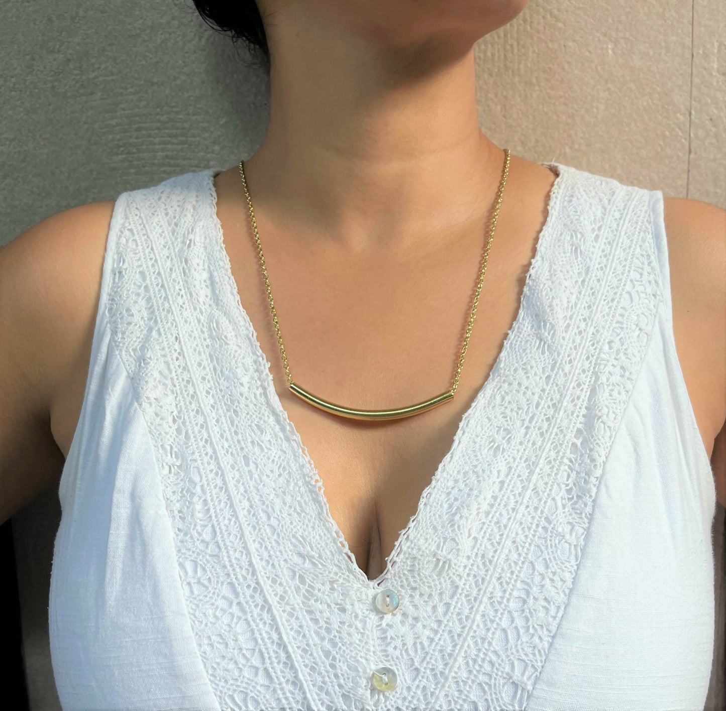 Gold Curve Bar pendant with chain