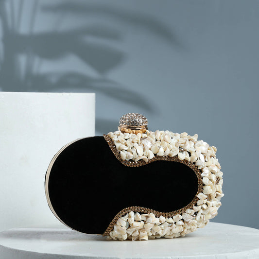 Black Shell Oval Clutch: Sleek Sophistication